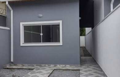 Imagem: A casa possui 2 Dormitórios, 2 Banheiros, 2 Vagas na garagem