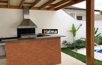 Imagem: A casa em condomínio possui 4 Dormitórios, 5 Banheiros, 4