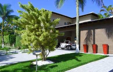 Imagem: A casa em condomínio possui 5 Dormitórios, 5 Banheiros, 4