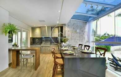 Imagem: A casa possui 5 Dormitórios, 5 Banheiros, 5 Vagas na garagem