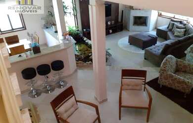 Imagem: A casa em condomínio possui 4 Dormitórios, 5 Banheiros, 5