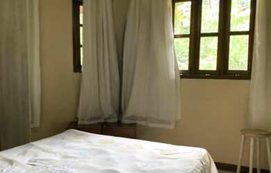 Imagem: A casa possui 4 Dormitórios, 4 Banheiros, 4 Vagas na garagem