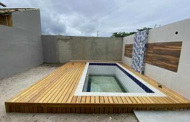 Imagem: A casa possui 4 Dormitórios, 4 Banheiros, 2 Vagas na garagem