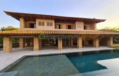 Imagem: A casa em condomínio possui 5 Dormitórios, 5 Banheiros, 1.000m²