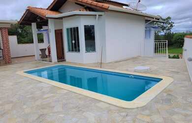 Imagem: A casa em condomínio possui 3 Dormitórios, 4 Banheiros, 2