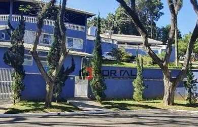 Imagem: A casa em condomínio possui 4 Dormitórios, 4 Banheiros, 5