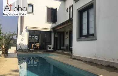 Imagem: A casa em condomínio possui 4 Dormitórios, 5 Banheiros, 5