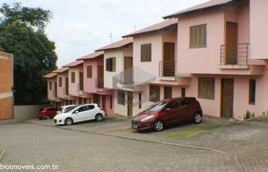Imagem: A casa possui 2 Dormitórios, 2 Banheiros, 1 Vaga na garagem