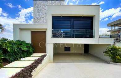 Imagem: A casa possui 4 Dormitórios, 5 Banheiros, 5 Vagas na garagem