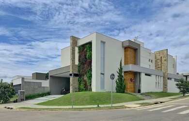 Imagem: A casa em condomínio à venda possui 4 Dormitórios, 5 Banheiros