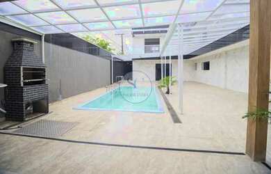 Imagem: A casa possui 5 Dormitórios, 2 Banheiros, 5 Vagas na garagem