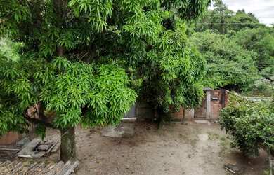 Imagem: A casa possui 3 Dormitórios, 2 Banheiros, 4 Vagas na garagem