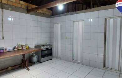 Imagem: A casa possui 4 Dormitórios, 4 Banheiros, 1 Vaga na garagem