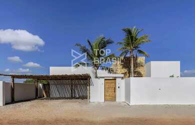 Imagem: A casa possui 4 Dormitórios, 5 Banheiros, 3 Vagas na garagem