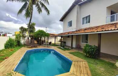 Imagem: A casa possui 4 Dormitórios, 4 Banheiros, 4 Vagas na garagem