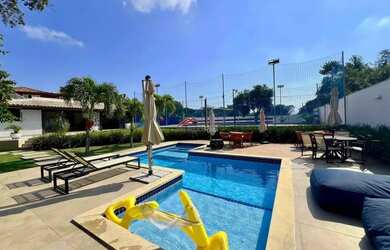 Imagem: A casa possui 5 Dormitórios, 5 Banheiros, 3 Vagas na garagem