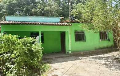 Imagem: A casa possui 3 Dormitórios, 2 Banheiros e está localizado