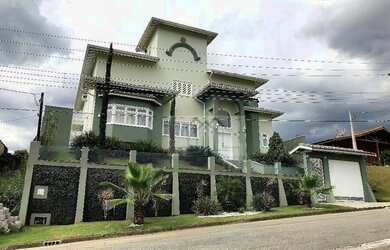 Imagem: A casa em condomínio à venda possui 4 Dormitórios, 5 Banheiros