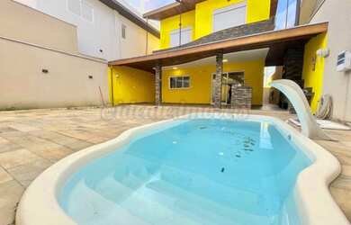 Imagem: A casa em condomínio possui 4 Dormitórios, 4 Banheiros, 3