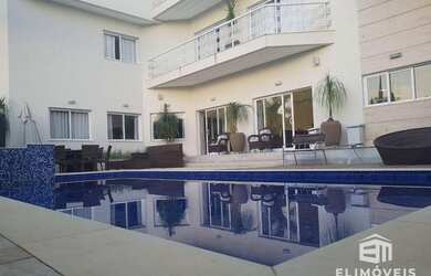 Imagem: A casa em condomínio possui 4 Dormitórios, 1 Banheiro, 5 Vagas