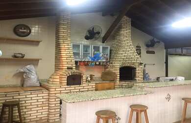 Imagem: A casa em condomínio possui 3 Dormitórios, 5 Banheiros, 4