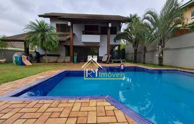 Imagem: A casa em condomínio possui 4 Dormitórios, 5 Banheiros, 3