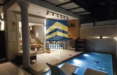 Imagem: A casa possui 2 Dormitórios, 3 Banheiros, 3 Vagas na garagem