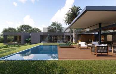 Imagem: A casa possui 5 Dormitórios, 5 Banheiros, 5 Vagas na garagem