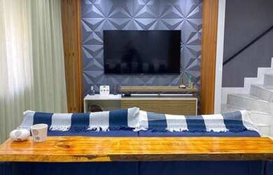 Imagem: A casa em condomínio possui 4 Dormitórios, 5 Banheiros, 3