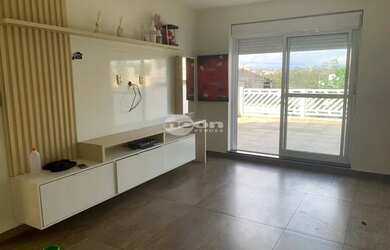 Imagem: A casa possui 2 Dormitórios, 2 Banheiros, 3 Vagas na garagem