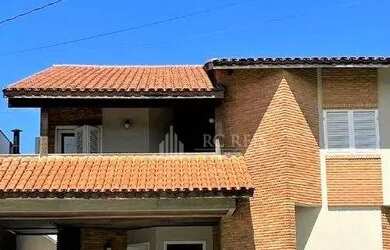 Imagem: A casa em condomínio possui 4 Dormitórios, 5 Banheiros, 4