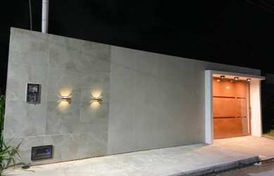 Imagem: A casa possui 3 Dormitórios, 4 Vagas na garagem e está localizado