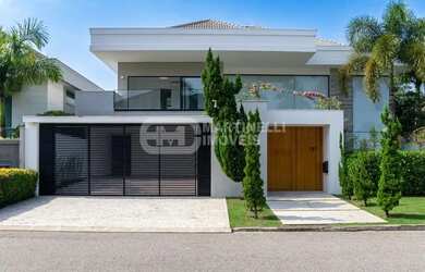 Imagem: A casa em condomínio à venda possui 5 Dormitórios, 5 Banheiros