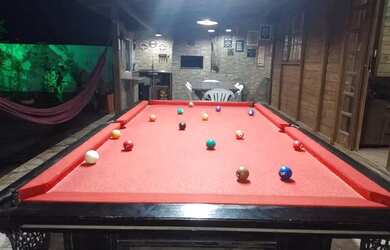 Imagem: A casa possui 3 Dormitórios, 3 Vagas na garagem e está localizado