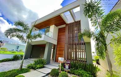 Imagem: A casa possui 3 Dormitórios, 4 Banheiros, 2 Vagas na garagem