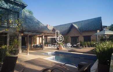 Imagem: A casa em condomínio possui 4 Dormitórios, 5 Banheiros, 5