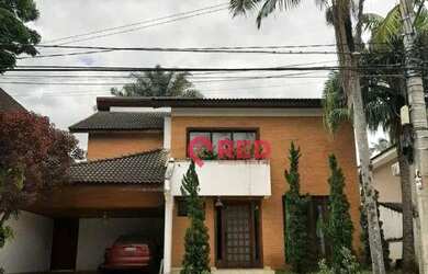 Imagem: A casa em condomínio possui 4 Dormitórios, 5 Banheiros, 310m²