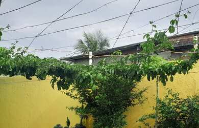 Imagem: A casa possui 2 Dormitórios, 3 Banheiros, 5 Vagas na garagem