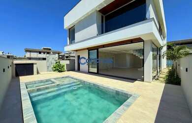 Imagem: A casa em condomínio possui 3 Dormitórios, 4 Banheiros, 2