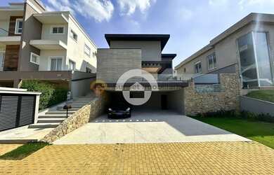 Imagem: A casa em condomínio possui 4 Dormitórios, 5 Banheiros, 5