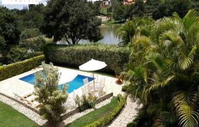 Imagem: A casa em condomínio possui 5 Dormitórios, 5 Banheiros, 5