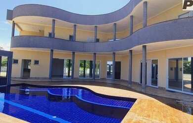 Imagem: A casa em condomínio possui 5 Dormitórios, 5 Banheiros, 5