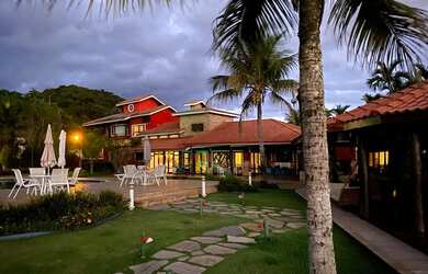 Imagem: A casa possui 4 Dormitórios, 5 Banheiros, 5 Vagas na garagem