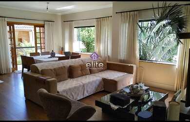 Imagem: A casa possui 3 Dormitórios, 5 Banheiros, 5 Vagas na garagem