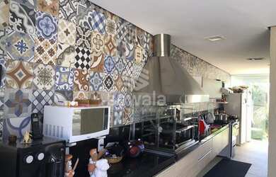 Imagem 12: Casa de condomínio para venda possui 350 metros quadrados com 4 quartos