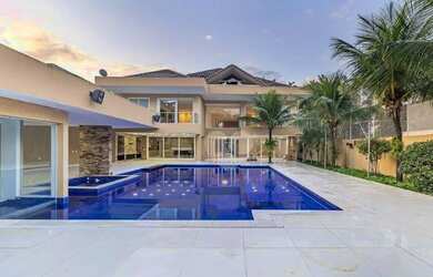 Imagem: A casa em condomínio possui 5 Dormitórios, 5 Banheiros, 4