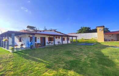 Imagem: A casa possui 3 Dormitórios, 4 Vagas na garagem e está localizado