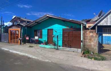 Imagem: A casa possui 4 Dormitórios, 2 Banheiros e 124m² de Área