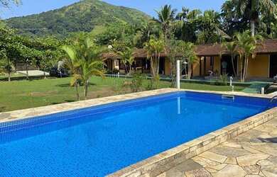 Imagem: A casa à venda possui 5 Dormitórios, 5 Banheiros, 5 Vagas