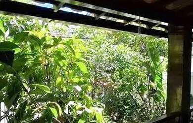 Imagem: A casa possui 4 Dormitórios, 3 Banheiros, 4 Vagas na garagem